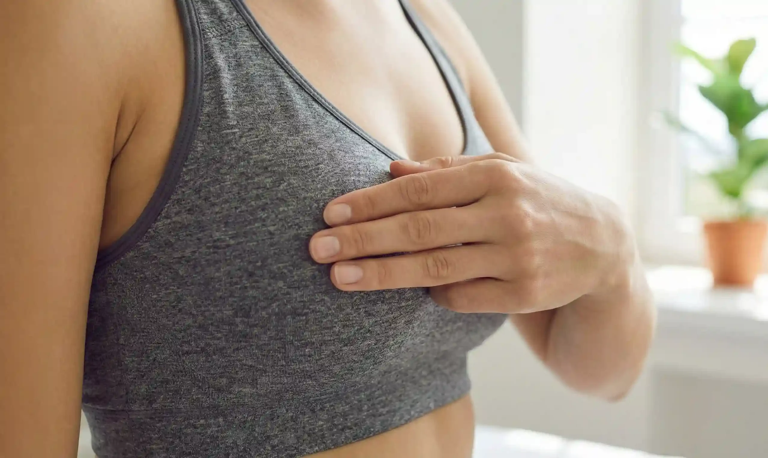 correct finger placement breast implant check closeup