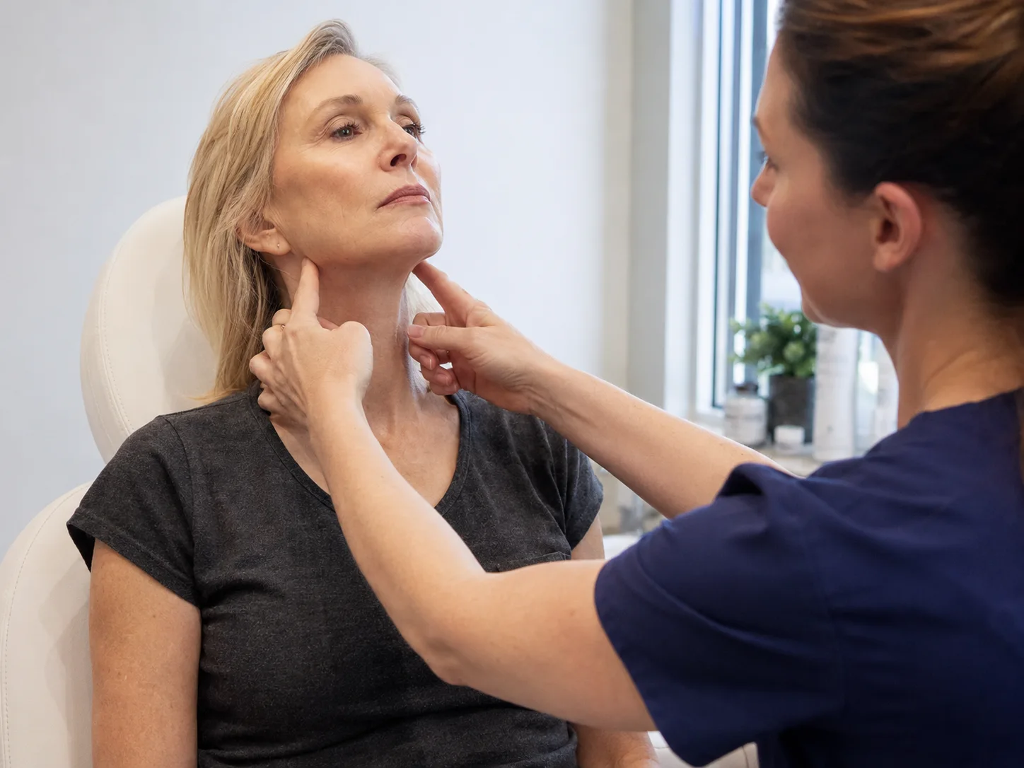 surgeon checks her neck lift
